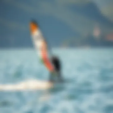 Beginner wing foiler gliding on water with a scenic backdrop