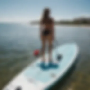 Infographic detailing factors to consider when choosing a paddle board size.