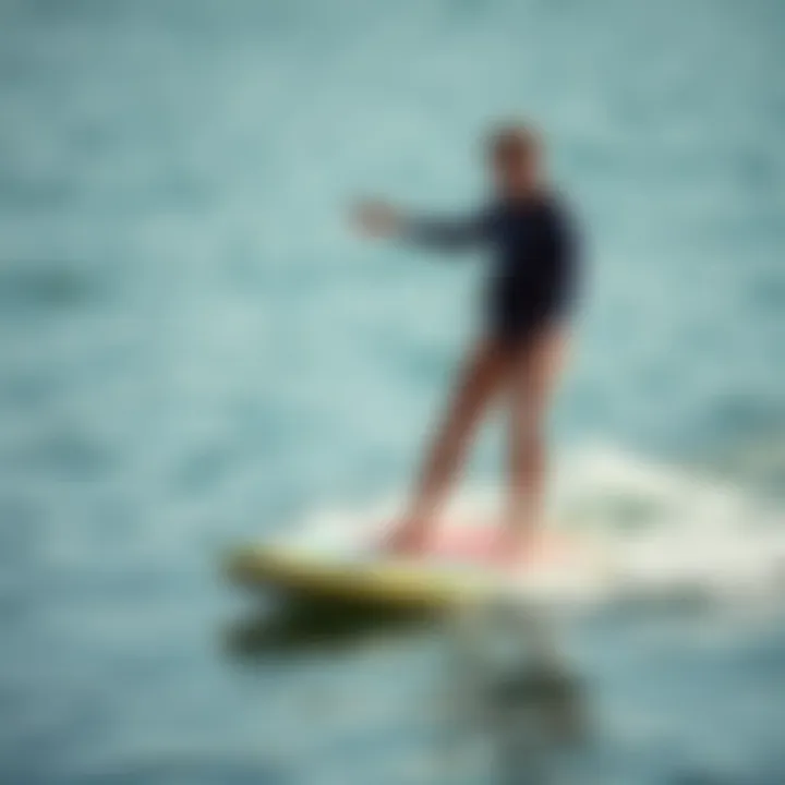 Skill and Balance in Watersports A close-up of a rider balancing on a board in calm waters, demonstrating skill and control