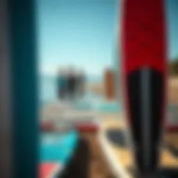 A diverse selection of paddle boards on the shore