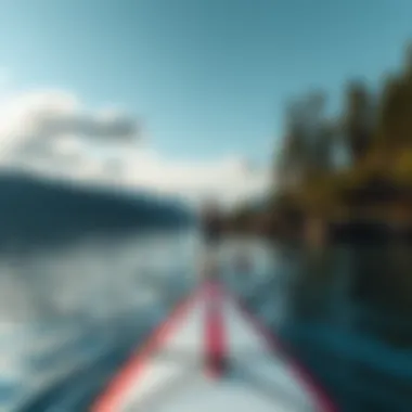 Ideal Water Conditions for Paddle Boarding A calm lake with picturesque water conditions for paddle boarding