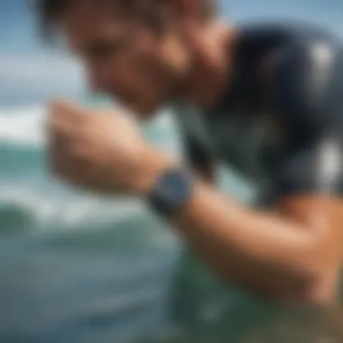 A surfer checking their watch while in the water