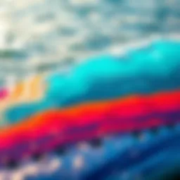 Vibrant acrylic artwork on a surfboard showcasing ocean waves