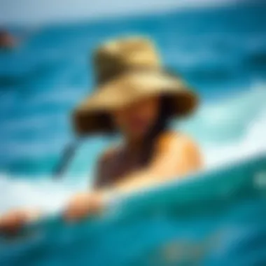 Woman enjoying watersports while wearing a Billabong bucket hat