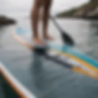 Close-up of a paddleboard fin and its design features