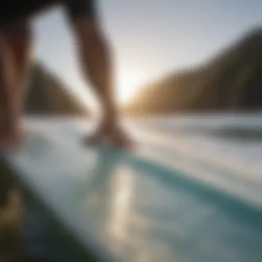 A surfer demonstrating fin placement on a surfboard