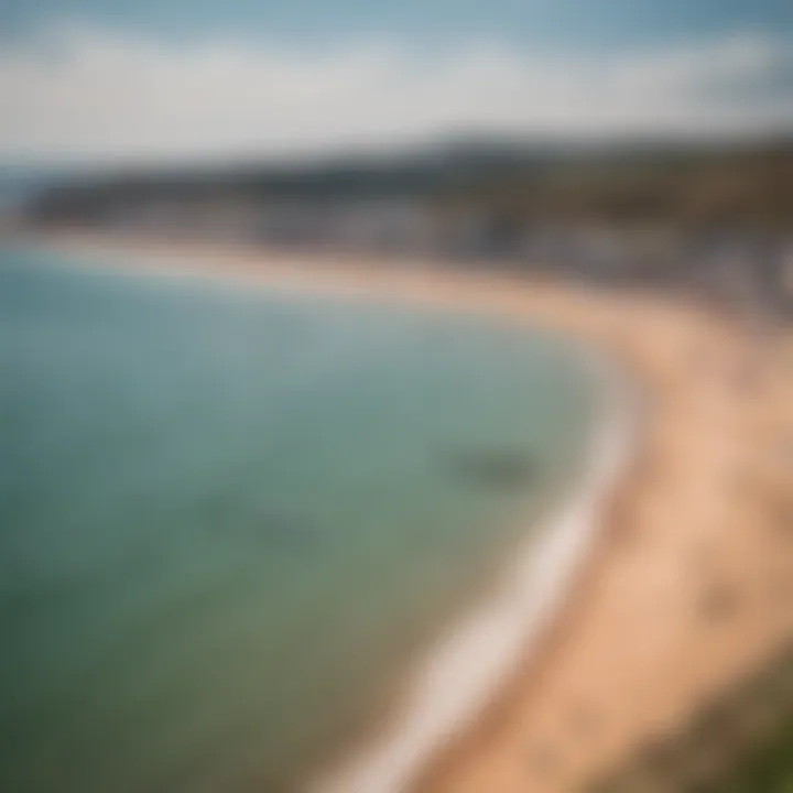 A scenic view of Exmouth beach bustling with activity, featuring sunbathers and watersport enthusiasts