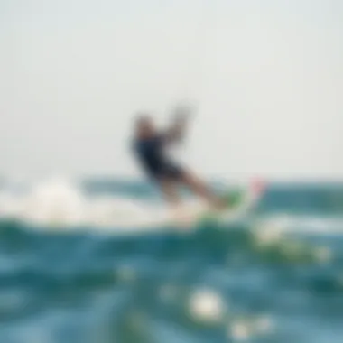 A kite surfer riding the waves