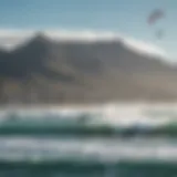 A stunning view of kite surfers riding the waves against the backdrop of Table Mountain