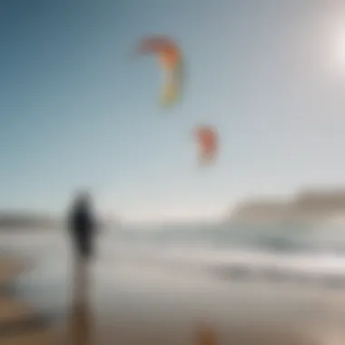 An instructor demonstrating kite control techniques to a student on the beach