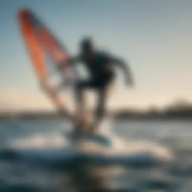 Kiteboarder gliding over the water with a dynamic wing in the background