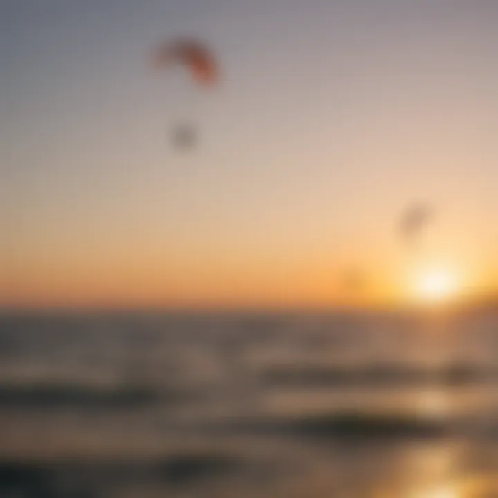 A breathtaking sunset over the sea with kitesurfers enjoying their late-afternoon session.