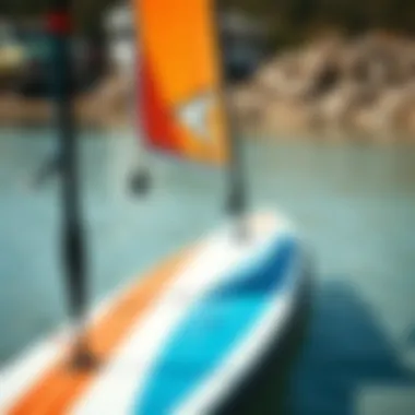 Installation of a sail on a paddle board at the beach