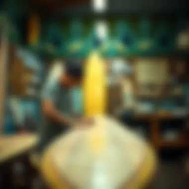 An artisan at work shaping a surfboard in a workshop adorned with Hawaiian motifs