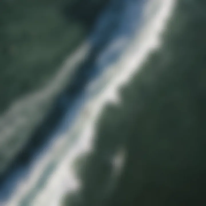 Aerial view of surfers riding waves at a busy surf spot in Huntington Beach, capturing the essence of surf culture.