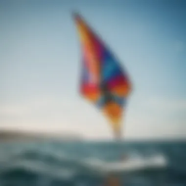 A stunning view of a colorful beat kite soaring in the sky above the ocean