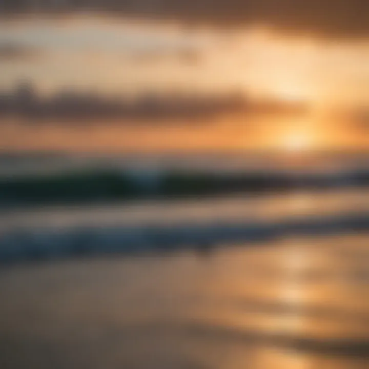 A vibrant sunset over Cocoa Beach with surfers in the water