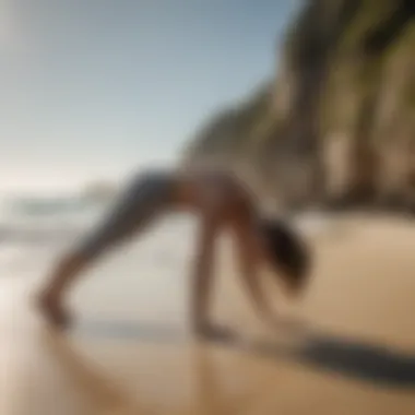 A serene beach setting with a yogi in downward dog pose, embodying balance and strength