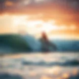 A serene beach scene showcasing a surfer catching a wave at sunrise