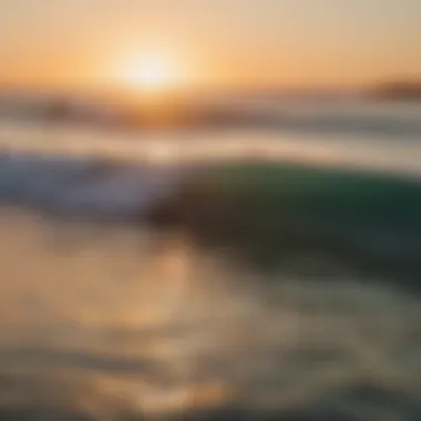 Surfers riding the waves during a vibrant sunset