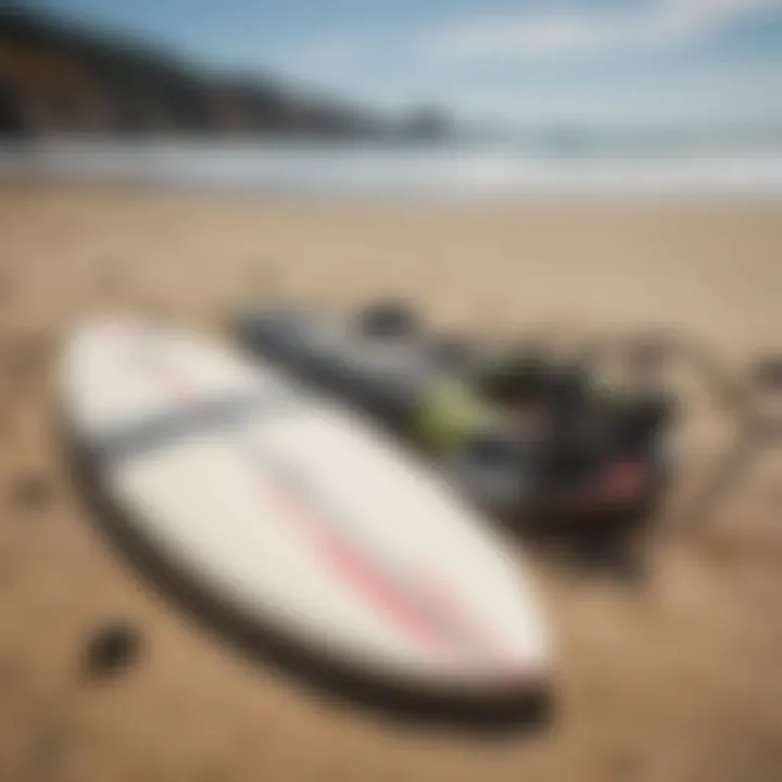 Detailed view of surfing equipment laid out on the beach