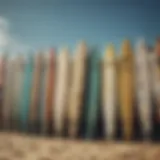 A collection of various used surfboards displaying different styles and conditions.