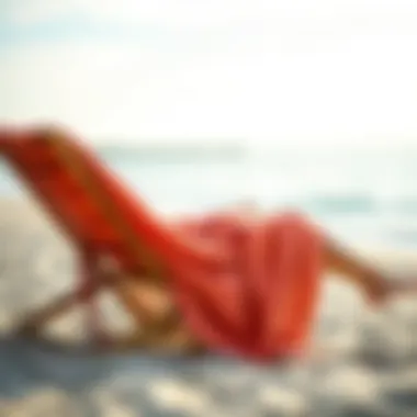 A stylish towelling poncho draped on a beach chair