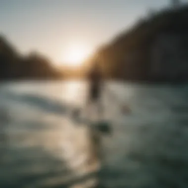 Paddleboarder gliding over warm waves