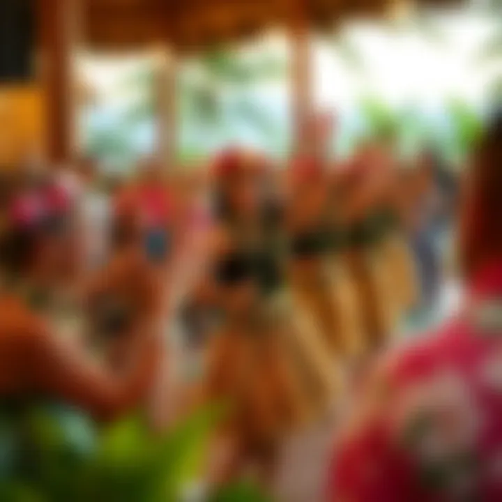 Traditional Hula Dancing Guests enjoying traditional hula dancing at a luau celebration