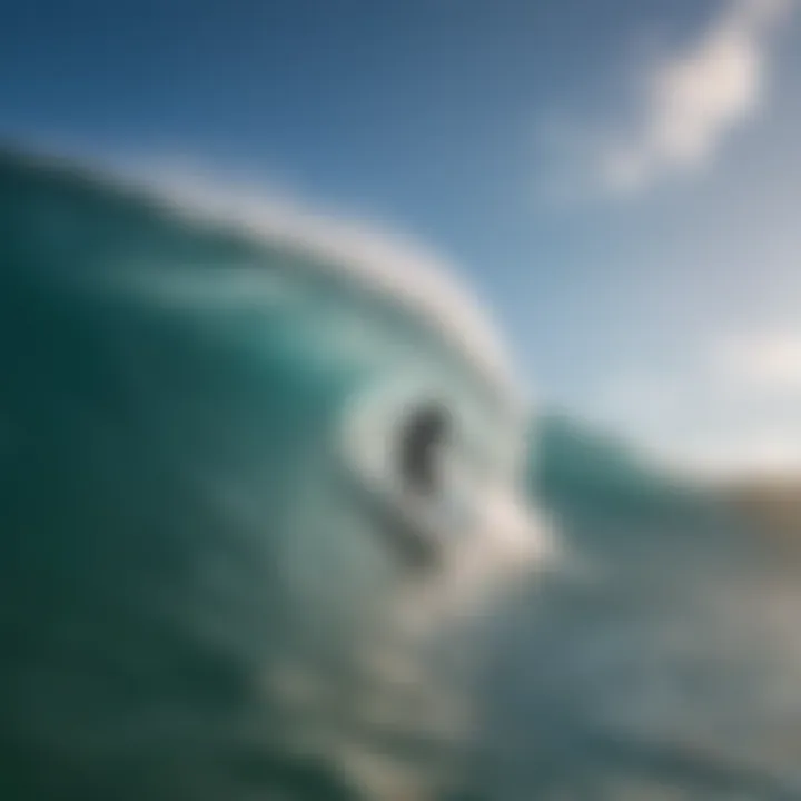 Surfer riding a wave at Cinnamon Dhonveli