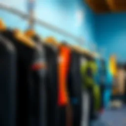 Diverse selection of top-rated wetsuits displayed on a rack
