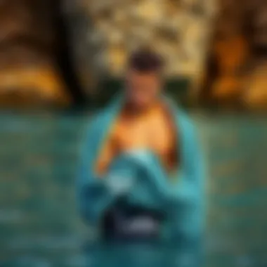 Individual using Billabong changing towel for comfort after swimming