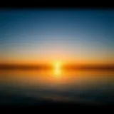 Tranquil sunset over the water with reflection