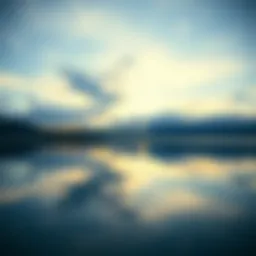 A serene landscape with a tranquil lake reflecting the sky