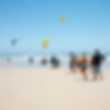 Kiteboarding Community at the Beach Group of kiteboarders enjoying a sunny day at the beach