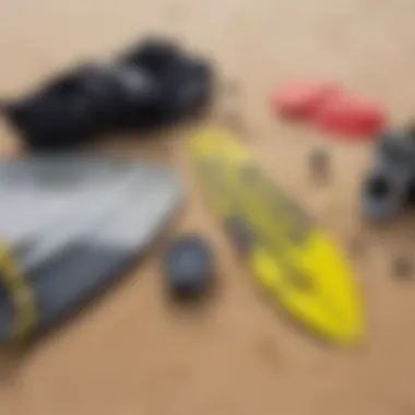 Close-up of kitesurfing equipment laid out on the sand