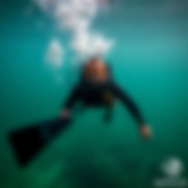 A diver demonstrating the agility provided by nautilus carbon fins underwater