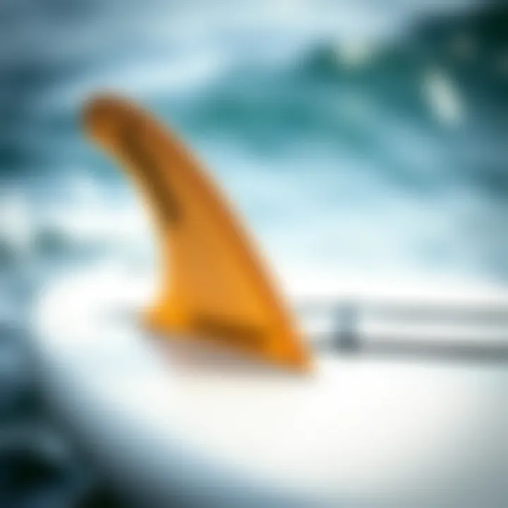 Detailing the Design Features of a 6ft Surfboard A close-up view of the fins and structure of a 6ft surfboard showcasing its design features