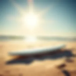 A sleek 6ft surfboard resting on the beach sand under a bright sun