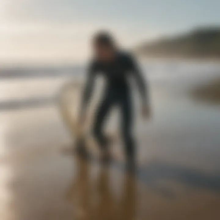 An environmentally conscious surfer collecting trash from the beach