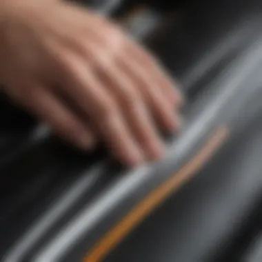 Seam Tape Application on Wetsuit Application of neoprene seam tape on a wetsuit seam for waterproofing.