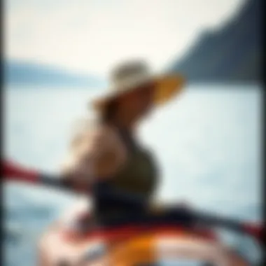 Performance in Action: The Patagonia Sun Hat on the Water Female enthusiast wearing the Patagonia sun hat while kayaking