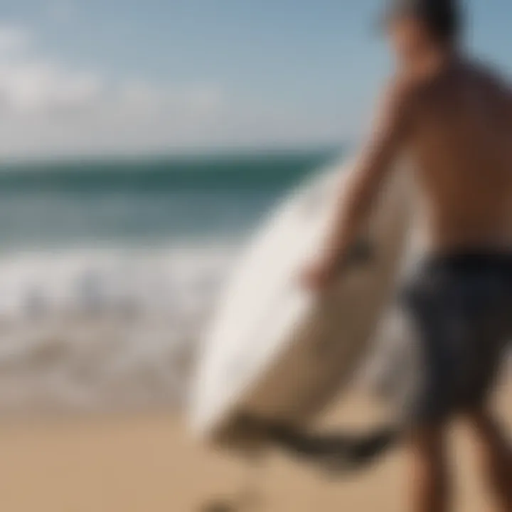 A surfer placing a surfboard into a protective Rip Curl bag before transport.