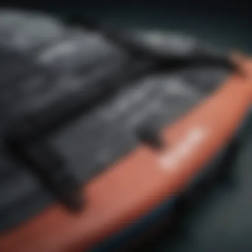 A detailed view of a Rip Curl surfboard bag showcasing its robust design and materials.