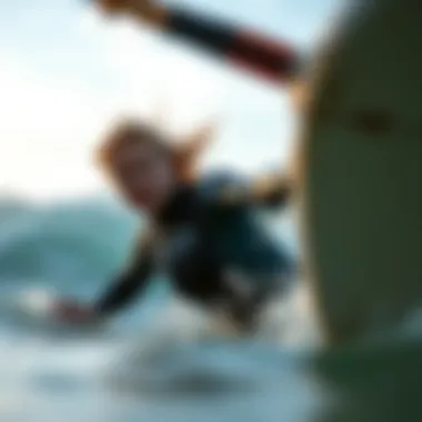 Action shot of athlete wearing RVCA wetsuit while surfing