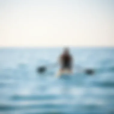 Paddle Boarding in Calm Waters Paddle boarder navigating through calm waters