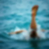 A swimmer experiencing calf muscle cramps