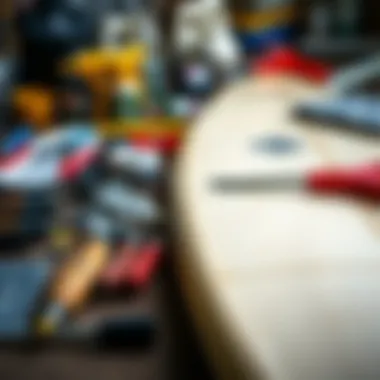 Tools and materials for surfboard repair laid out