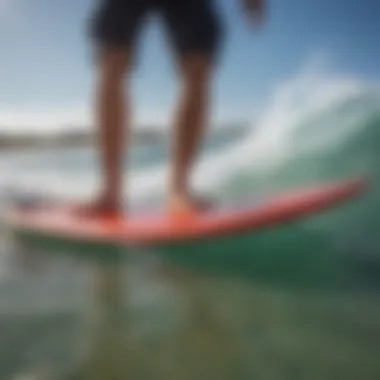 A close-up view of essential skimboarding gear including board and protective equipment