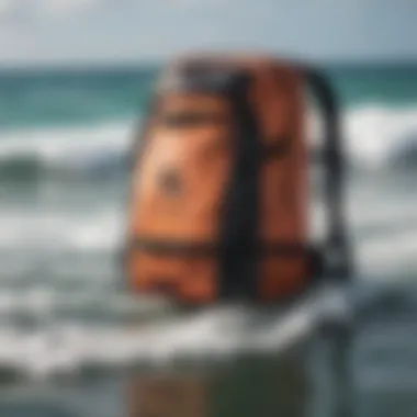 A kitesurf backpack made from durable materials, displayed against a backdrop of waves.